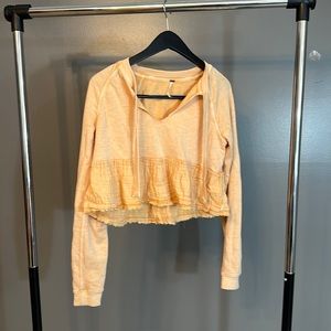 Free people cropped ruffle sweatshirt. Size XS